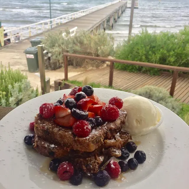 French fruit toast served with mixed berries and ice cream